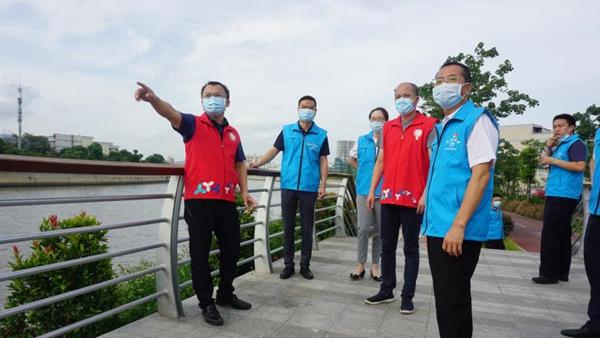 交流党建经验增强支部活力 企业社区结对共建促发展