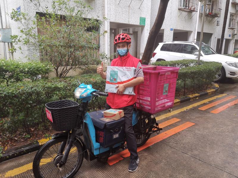 包裹也文明 快递员穿上红马甲 华富街道