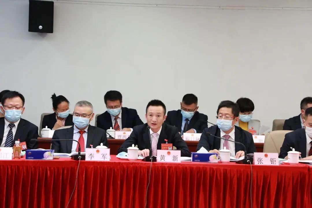 深圳两会龙华区民营企业家热议政府工作报告发出龙华好声音二